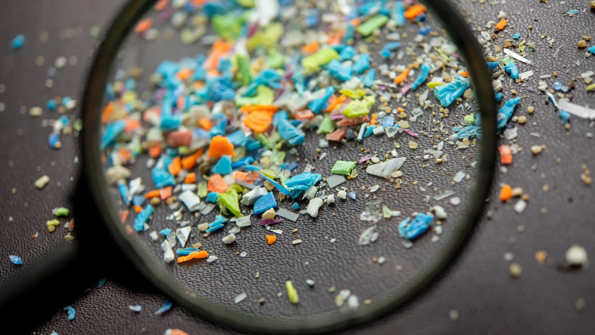 Small plastic fragments representing the problem of persistent plastic waste